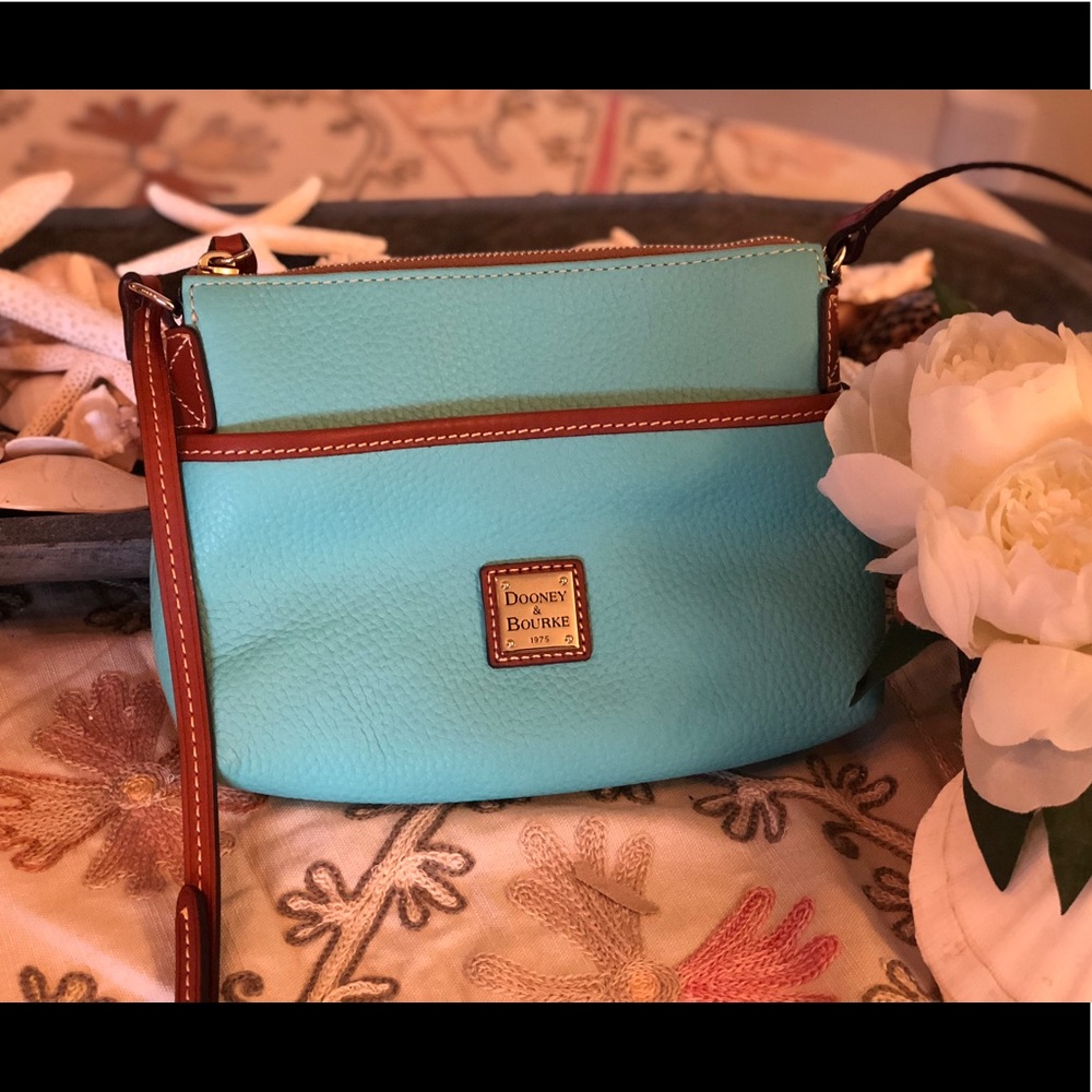 Dooney&Burke cross body aqua bag. Never used.